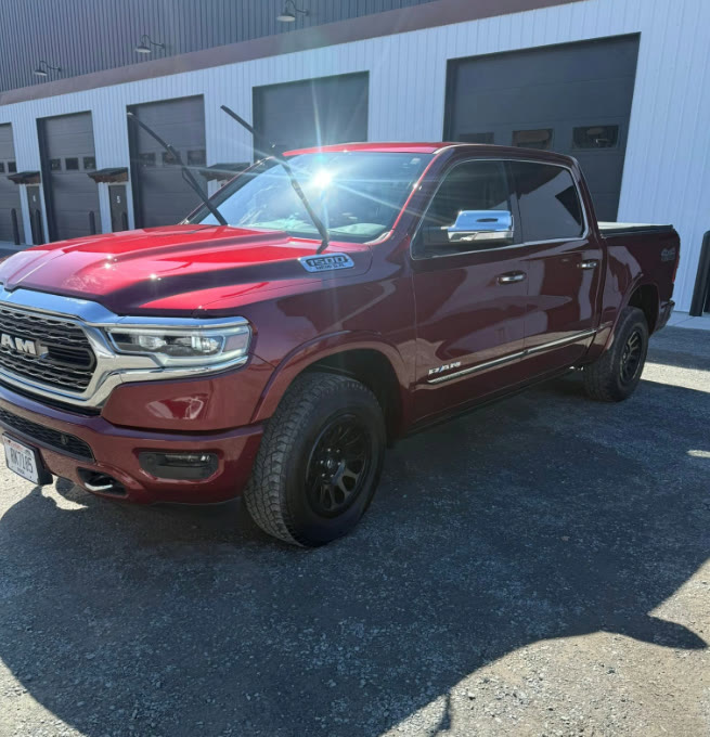 The same red Ram 1500 Limited with glossy clean paint after an exterior detail by M&B Auto Detailing